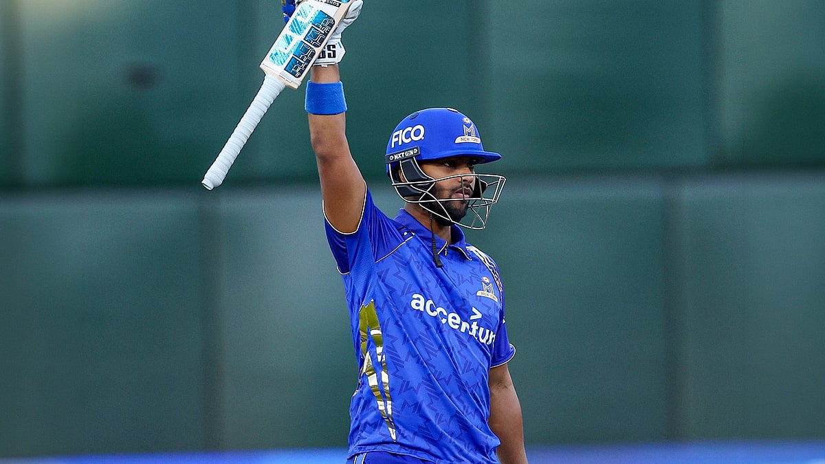 MI New York captain Nicholas Pooran celebrates after reaching his century during the MLC 2026 Eliminator against Washington Freedom. Pooran's blistering 31-ball hundred became the fastest century in Major League Cricket history and one of several records set during the historic contest. - X/MINYCricket