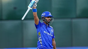 X/MINYCricket : MI New York captain Nicholas Pooran celebrates after reaching his century during the MLC 2026 Eliminator against Washington Freedom. Pooran's blistering 31-ball hundred became the fastest century in Major League Cricket history and one of several records set during the historic contest.
