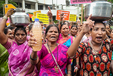 Residents of the Wagle Estate area stage a protest outside the Thane Municipal Corporation headquarters, alleging muddy and low-pressure water supply since the onset of the monsoon, in Thane, Maharashtra. The protesters demanded immediate restoration of a clean, uninterrupted water supply and urged the civic administration to take urgent steps to resolve the ongoing water shortage. 