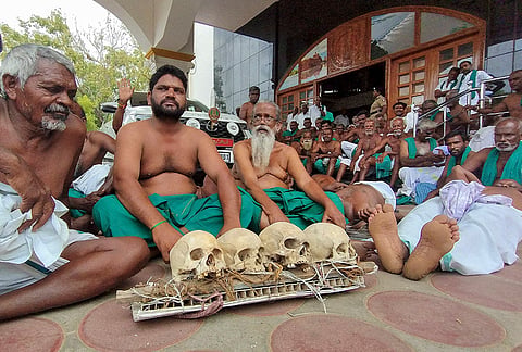 Farmers led by P. Ayyakkannu, State President of the National South Indian Rivers Inter-Linking Farmers Association, stage a half-naked protest with human skulls outside the District Collectorate, demanding a waiver of agricultural loans, remunerative prices for crops, and a permanent solution to the Cauvery water-sharing issue, in Tiruchirappalli, Tamil Nadu. The protesters said the symbolic demonstration highlighted the severe distress faced by farmers across the state. 