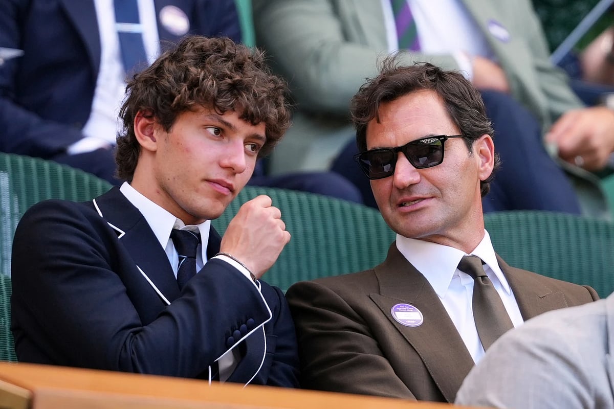 Andrea Kimi Antonelli (left) with tennis icon Roger Federer at Wimbledon. - AP