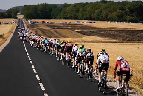 The pack rides during the eleventh stage of the Tour de France cycling race with start in Vichy and finish in Nevers, France, Wednesday, July 15, 2026. 