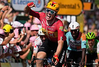 Waerenskjold Powers To Victory During Stage 11 As Pogacar Protects Tour de France Lead | Photo: AP/Mosa'ab Elshamy : Norway's Soren Waerenskjold celebrates as he crosses the finish line to win the eleventh stage of the Tour de France cycling race with start in Vichy and finish in Nevers, France, Wednesday, July 15, 2026.