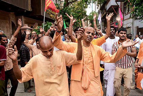 Priests dance as they take part in a procession of Lord Jagannath, Lord Balabhadra and Goddess Subhadra during the annual Rath Yatra, in Mumbai, Maharashtra, Thursday, July 16, 2026. 