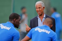 AP/File-Eranga Jayawardena : West Indies cricket great Garfield Sobers, right, chats with West Indies team members during a training session ahead of their second test cricket match against Sri Lanka in Colombo, Sri Lanka, Oct. 21, 2015.