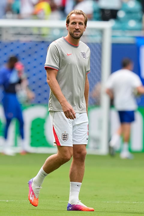 England's Harry Kane (9) walks on the pitch prior to the World Cup third-place playoff soccer match between France and England in Miami Gardens