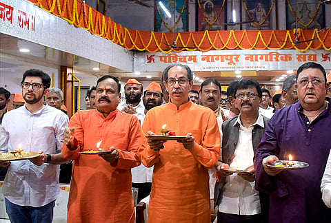 Shivsena (UBT) chief Uddhav Thackeray along with Maharashtra Legislative Assembly member Aaditya Thackeray, MP Sanjay Raut and others offer prayers at Ram Mandir as part of 'Ram Raksha' protest, in Nagpur, Maharashtra.