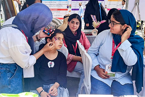 A girl gets her face painted during the third edition of 9-day Chinar Book festival, in Srinagar, Jammu and Kashmir. Over 200 publishers and book stalls displaying titles in English, Urdu, Kashmiri, Hindi and several other Indian languages will feature in the festival from July 18-26. 