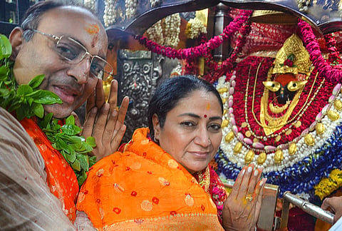Delhi Chief Minister Rekha Gupta along with her husband Manish Gupta offer prayers at Vindhyavasini Temple during a visit, in Mirzapur, Uttar Pradesh.
