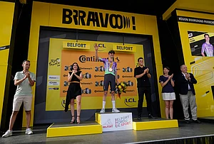 | Photo: AP/Mosa'ab Elshamy : Switzerland's Mauro Schmid celebrates on the podium after winning the thirteenth stage of the Tour de France cycling race with start in Dole and finish in Belfort, France, Friday, July 17, 2026.