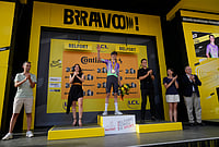 | Photo: AP/Mosa'ab Elshamy : Switzerland's Mauro Schmid celebrates on the podium after winning the thirteenth stage of the Tour de France cycling race with start in Dole and finish in Belfort, France, Friday, July 17, 2026.