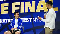(AP Photo/Frank Franklin II) : Argentina's Lionel Messi listens to tennis player Novak Djokovic during a news conference ahead of the World Cup final soccer match between Spain and Argentina in New York, Friday, July 17, 2026