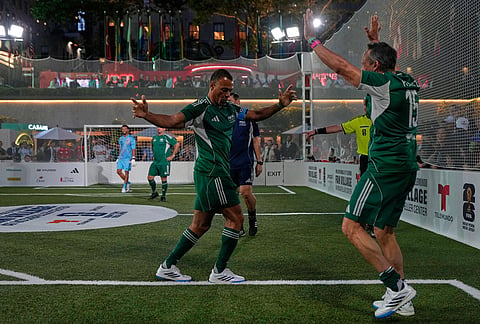 Soccer legends, Brazil's Cafu, left, and Mexico's Luis Hernandez react during a FIFA legends soccer match being played two days ahead of the World Cup final in New York, Friday, July 17, 2026. 