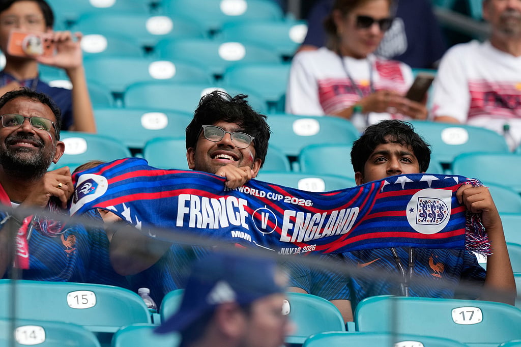 Fans wait for the World Cup third-place playoff soccer match between France and England in Miami Gardens