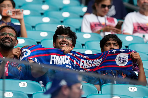Fans wait for the World Cup third-place playoff soccer match between France and England in Miami Gardens