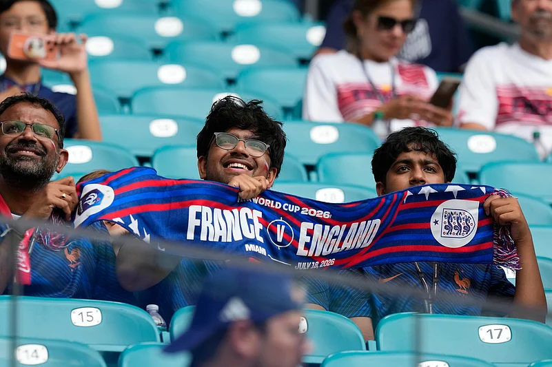 Fans wait for the World Cup third-place playoff soccer match between France and England in Miami Gardens