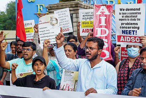 All India Democratic Students' Organisation (AIDSO) members raise slogans during a protest against the alleged removal of climate activist Sonam Wangchuk from an indefinite hunger strike, in Bengaluru, Karnataka.