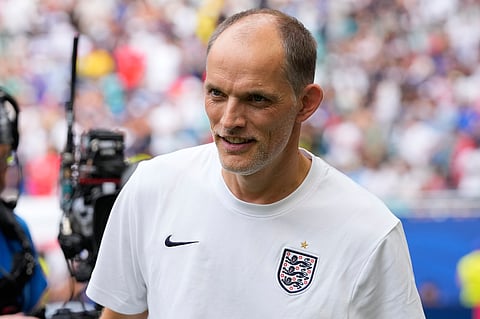 England head coach Thomas Tuchel stands on the pitch prior to the World Cup third-place playoff soccer match between France and England in Miami Gardens
