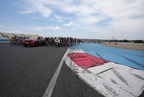 Riders take the start during the twelfth stage of the Tour de France cycling race with start in Circuit Nevers Magny-Cours and finish in Chalon-sur-Saone, France, Thursday, July 16, 2026.