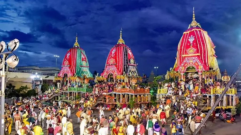 Puri Jagannath Rath Yatra chariots surrounded by devotees - null