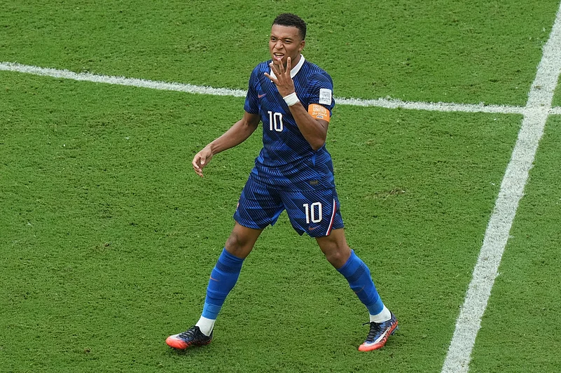 Frances Kylian Mbappe (10) celebrates scoring their third goal during the World Cup third-place playoff soccer match between France and England in Miami Gardens
