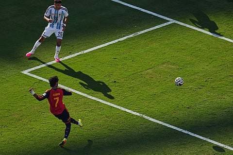 Spain's Ferran Torres (7) scores their first goal during the World Cup final soccer match between Spain and Argentina in East Rutherford, N.J., near New York, Sunday, July 19, 2026.