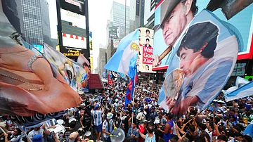 (AP Photo/Julio Cortez) : Argentina fans gather for a rally on the eve of the World Cup final soccer match in New York's Time Square, Saturday, July 18, 2026.