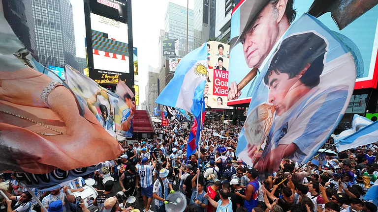 Argentina fans gather for a rally on the eve of the World Cup final soccer match in New York's Time Square, Saturday, July 18, 2026. - (AP Photo/Julio Cortez)
