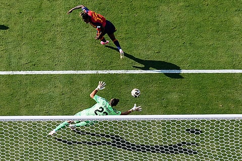 Argentina goalkeeper Emiliano Martinez (23) makes a save against Spain's Nico Williams (17) during the World Cup final soccer match between Spain and Argentina in East Rutherford, N.J., near New York, Sunday, July 19, 2026.