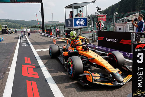McLaren driver Lando Norris of Britain gets out of his car after qualification ahead of the Formula One Grand Prix at the Spa-Francorchamps racetrack in Spa, Belgium.