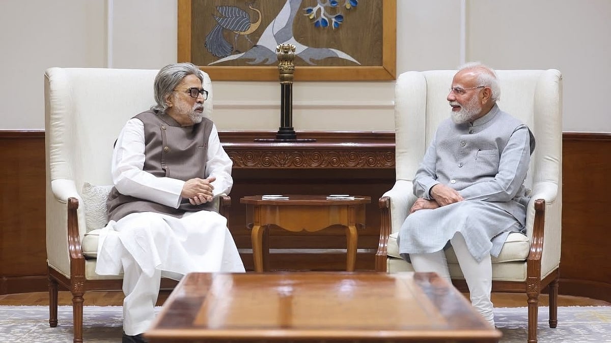 Sudip Bandyopadhyay with PM Narendra Modi  - null
