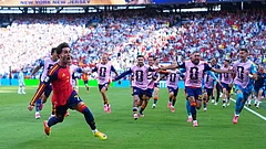 Spain's Ferran Torres (7) celebrates scoring their first goal during the World Cup final soccer match between Spain and Argentina in East Rutherford, N.J., near New York, Sunday, July 19, 2026. - (AP Photo/Julio Cortez)