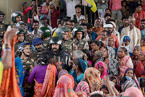 Security personnel remove protesters from the banks of the Barana river, bringing a 15-day agitation against the Ken-Betwa Link and other development projects to an end, in Chhatarpur district, Madhya Pradesh.