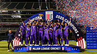 X/MLCricket : Los Angeles Knight Riders players celebrate with the MLC 2026 championship trophy amid fireworks and confetti after their dramatic one-run victory over Washington Freedom at the Oakland Coliseum