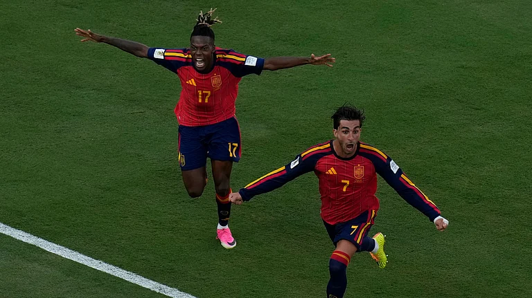 Spain's Ferran Torres (7) celebrates after scoring the opening goal of his team during the World Cup final soccer match between Spain and Argentina in East Rutherford, N.J., near New York, Sunday, July 19, 2026. - (AP Photo/Seth Wenig)