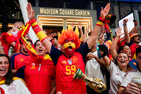 Spain fans gather for a rally on the eve of the World Cup final soccer match in New York's Times Square, Saturday, July 18, 2026