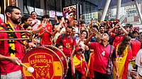 (AP Photo/Yuki Iwamura) : Spain fans gather for a rally on the eve of the World Cup final soccer match in New York's Times Square, Saturday, July 18, 2026.