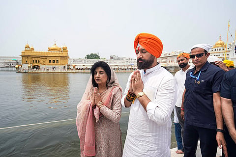 Union Minister and National President of Lok Janshakti Party Chirag Paswan along with his mother Reena Paswan offer prayers at Golden Temple, in Amritsar.