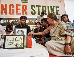 CPI(M) leader Brinda Karat meets Cockroach Janata Party (CJP) founder Abhijeet Dipke as he begins indefinite hunger strike at Jantar Mantar after activist Sonam Wangchuk, unseen, who has been on an indefinite hunger strike for 21 days, was shifted to a hospital for medical care, in New Delhi, Saturday, July 18, 2026. - PTI