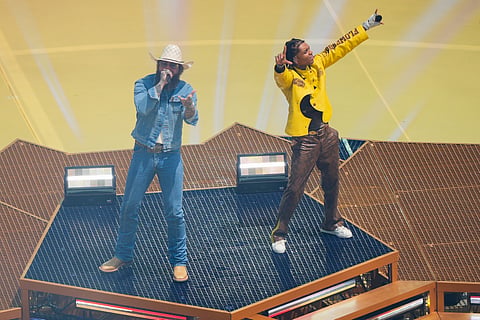 Singer Post Malone, left and Swae Lee perform prior to the World Cup final soccer match between Spain and Argentina in East Rutherford, N.J., near New York, Sunday, July 19, 2026.