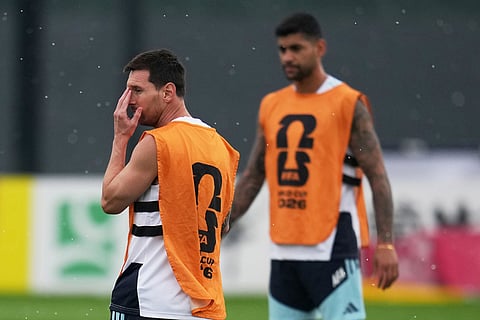 Argentina's Lionel Messi watches during a training session on the eve of the World Cup final soccer match in Morristown, N.J.