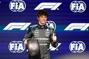 | Photo: AP/Geert Vanden Wijngaert : Mercedes driver Andrea Kimi Antonelli of Italy celebrates on the podium after clocking the fastest time during the qualifying session ahead of the Formula One Grand Prix at the Spa-Francorchamps racetrack in Spa, Belgium.