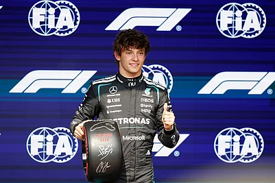 | Photo: AP/Geert Vanden Wijngaert : Mercedes driver Andrea Kimi Antonelli of Italy celebrates on the podium after clocking the fastest time during the qualifying session ahead of the Formula One Grand Prix at the Spa-Francorchamps racetrack in Spa, Belgium.