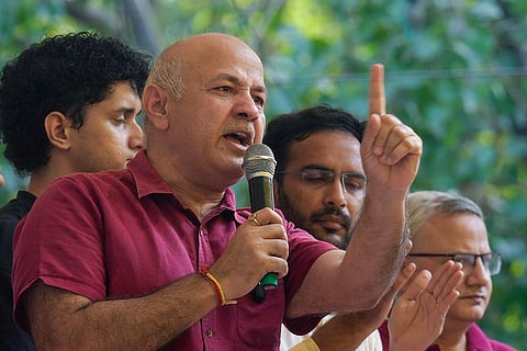 AAP leader Manish Sisodia during the Cockroach Janata Party (CJP) protest demanding Union Education Minister Dharmendra Pradhan's resignation over alleged irregularities in the NEET examination, at the Jantar Mantar in New Delhi.