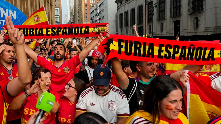 Spain fans gather for a rally on the eve of the World Cup final soccer match in New York's Times Square, Saturday, July 18, 2026. - (AP Photo/Yuki Iwamura)