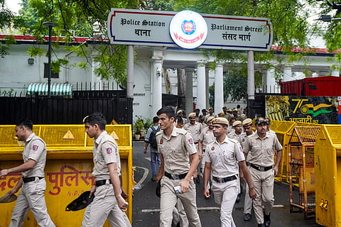 Police personnel leave from Parliament Street police station ahead of Cockroach Janata Party’s (CJP) protest march, in New Delhi.