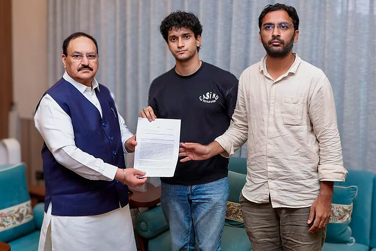 In this image posted on July 20, 2026, Union Minister JP Nadda, left, meets Cockroach Janta Party (CJP) spokespersons Saurav Das and Ashutosh Ranka amid an ongoing protest by CJP over the alleged NEET paper leak, in New Delhi. - Photo: @SauravDassss/X via PTI