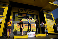 | Photo: AP/Mosa'ab Elshamy : Belgium's Remco Evenepoel celebrates on podium after he won the fifteenth stage of the Tour de France cycling race, from Champagnole to Plateau de Solaison, France, Sunday, July 19, 2026. 
