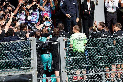 Mercedes driver Andrea Kimi Antonelli of Italy, center, is congratulated by his team after winning the Formula One Grand Prix at the Spa-Francorchamps racetrack in Spa, Belgium.