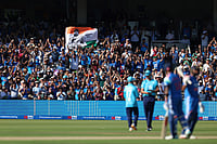 IND Vs ENG, 3rd ODI: India Lose By 27 Runs, Suffer Series Defeat | Photo: Steven Paston/PA via AP : India fans celebrate in the stands after Rohit Sharma reaches his century during the third ODI between England and India, at Lord's cricket ground, London.